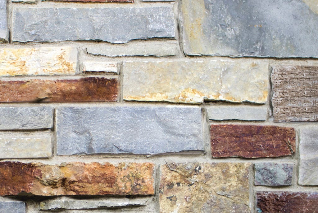 ashlar pattern stone veneer installation - wall stone veneer