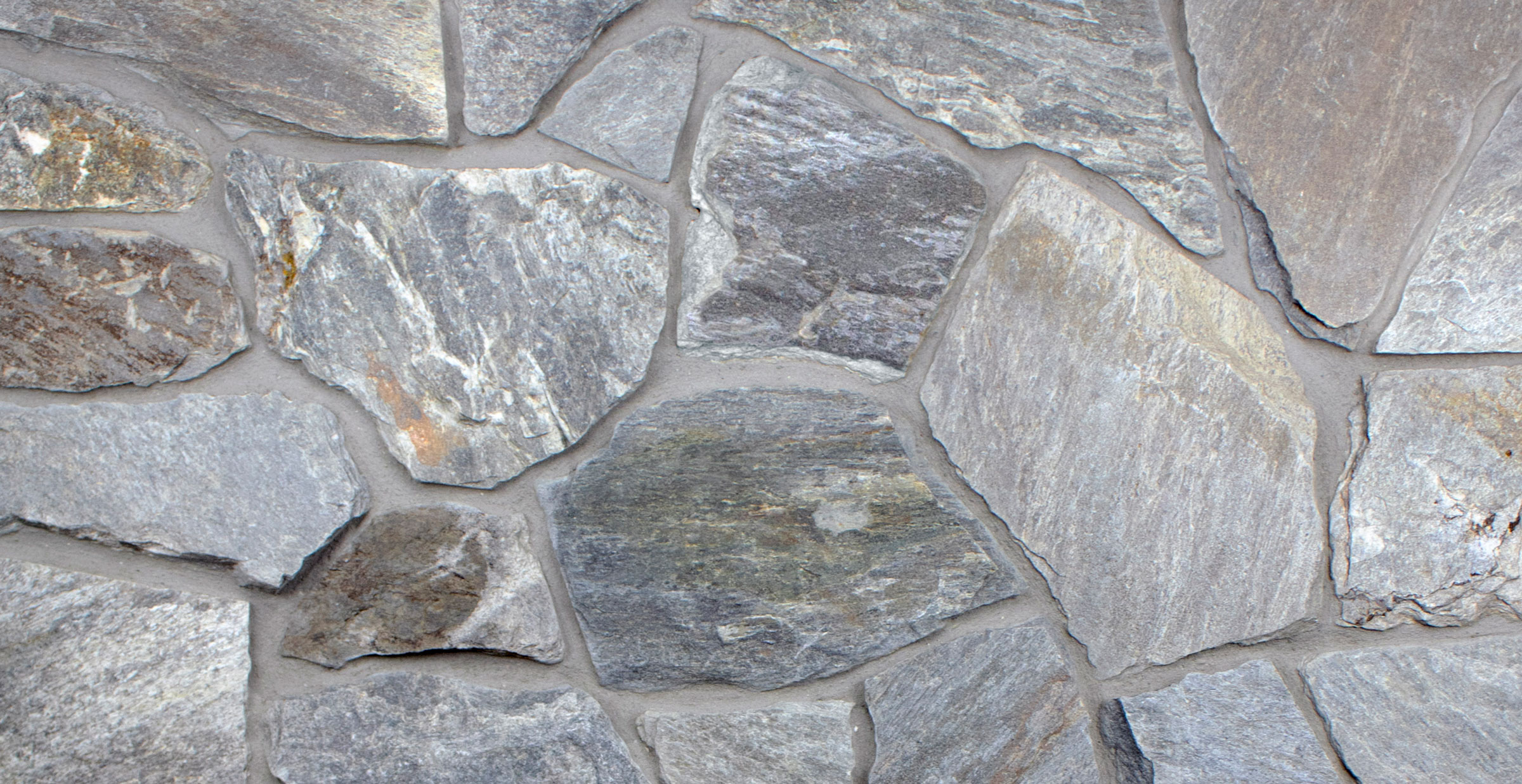 Brushed Steel Webwall veneer stone masonry - Mosaic Stone - fieldstone veneer - Buechel Stone project gallery photo - Full & Thin Stone Veneer