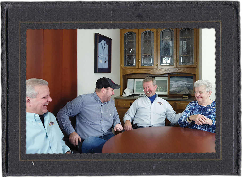 Family of Founder of Natural Stone Veneer Company in Buechel Stone conference room.