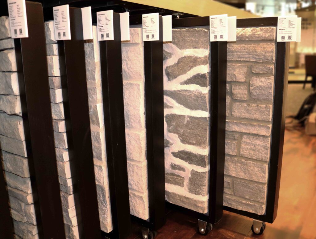 Buechel stone design showroom full & thin stone veneer, natural stone landscape cut stone supplier showroom table displays