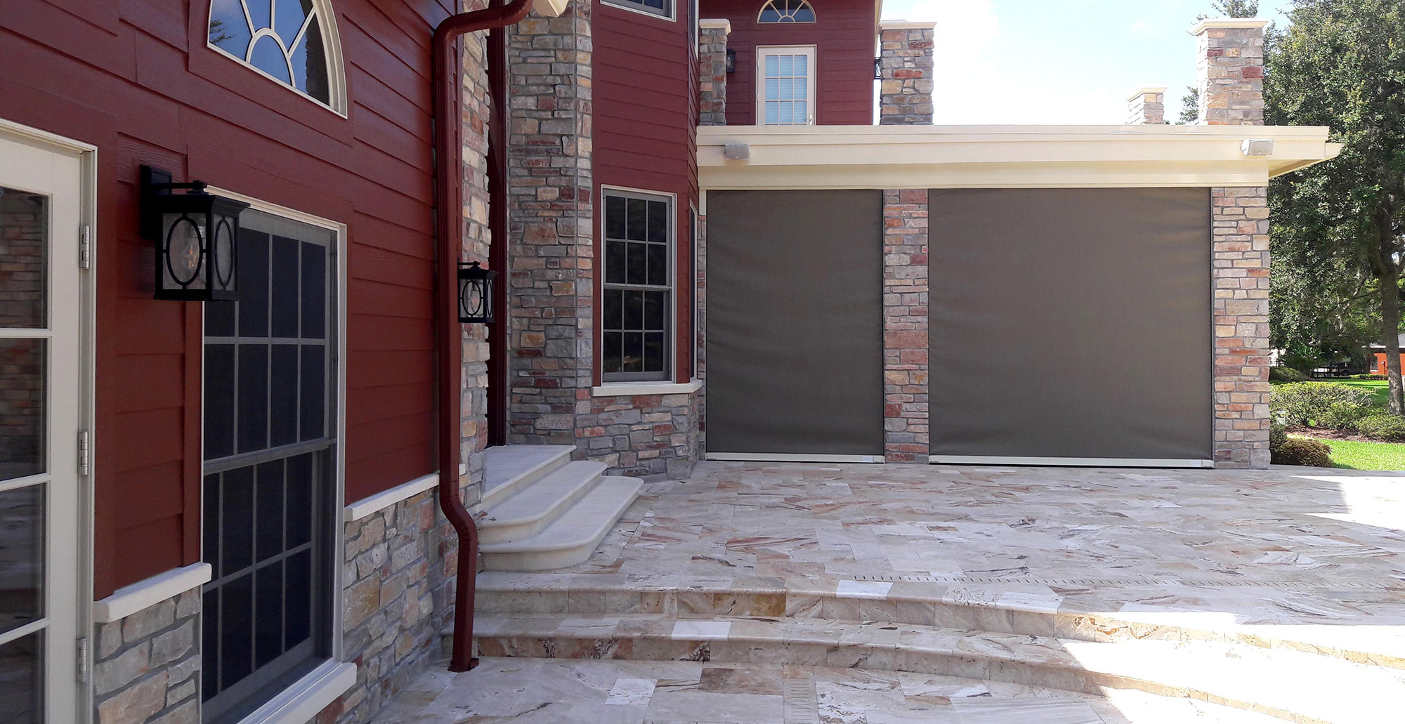 Modern rustic dream home full thin stone veneer exterior craftsman entry outdoor patio landscaping HERO 1280x660 ee